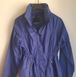 Novelti blue rain jacket with packable hood